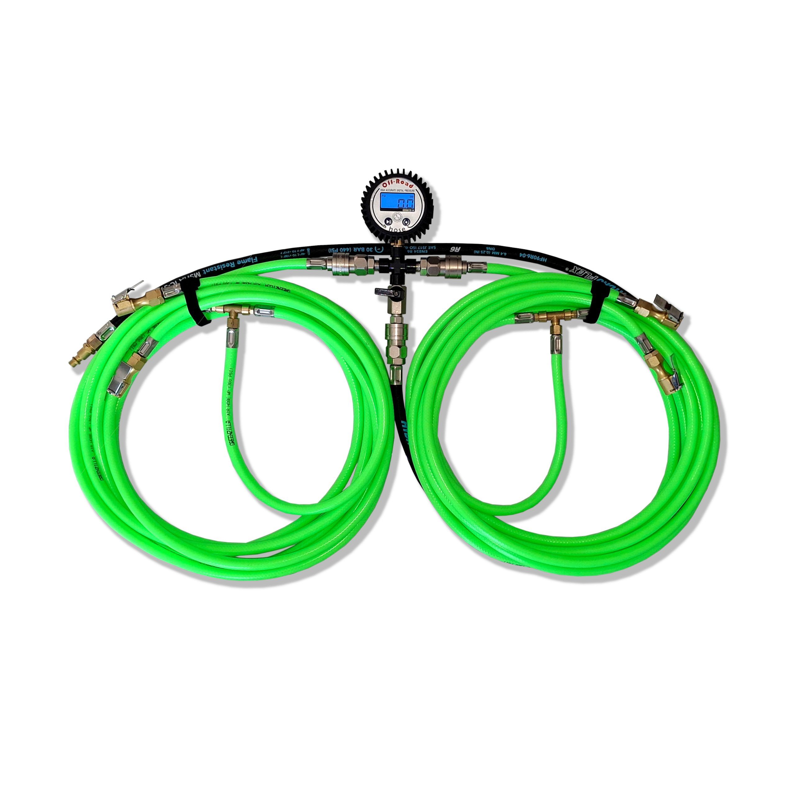 The Greenzilla 4in1 kit: coiled high-vis green hoses and a digital pressure gauge on the centre hub.